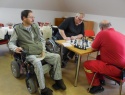 Průběh zápasu pozoruje předseda ŠO TP Habrovany Zdena Baldík.jpg