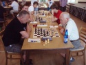 Nejúspěšnější náš hráč vpravo v boji  s nasazenou dvojkou turnaje ukrajincem Evgeniem Piankovem.jpg
